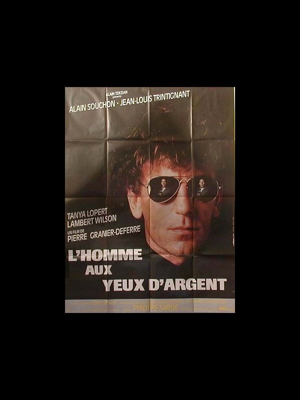 Affiche du film L'HOMME AUX YEUX D'ARGENT